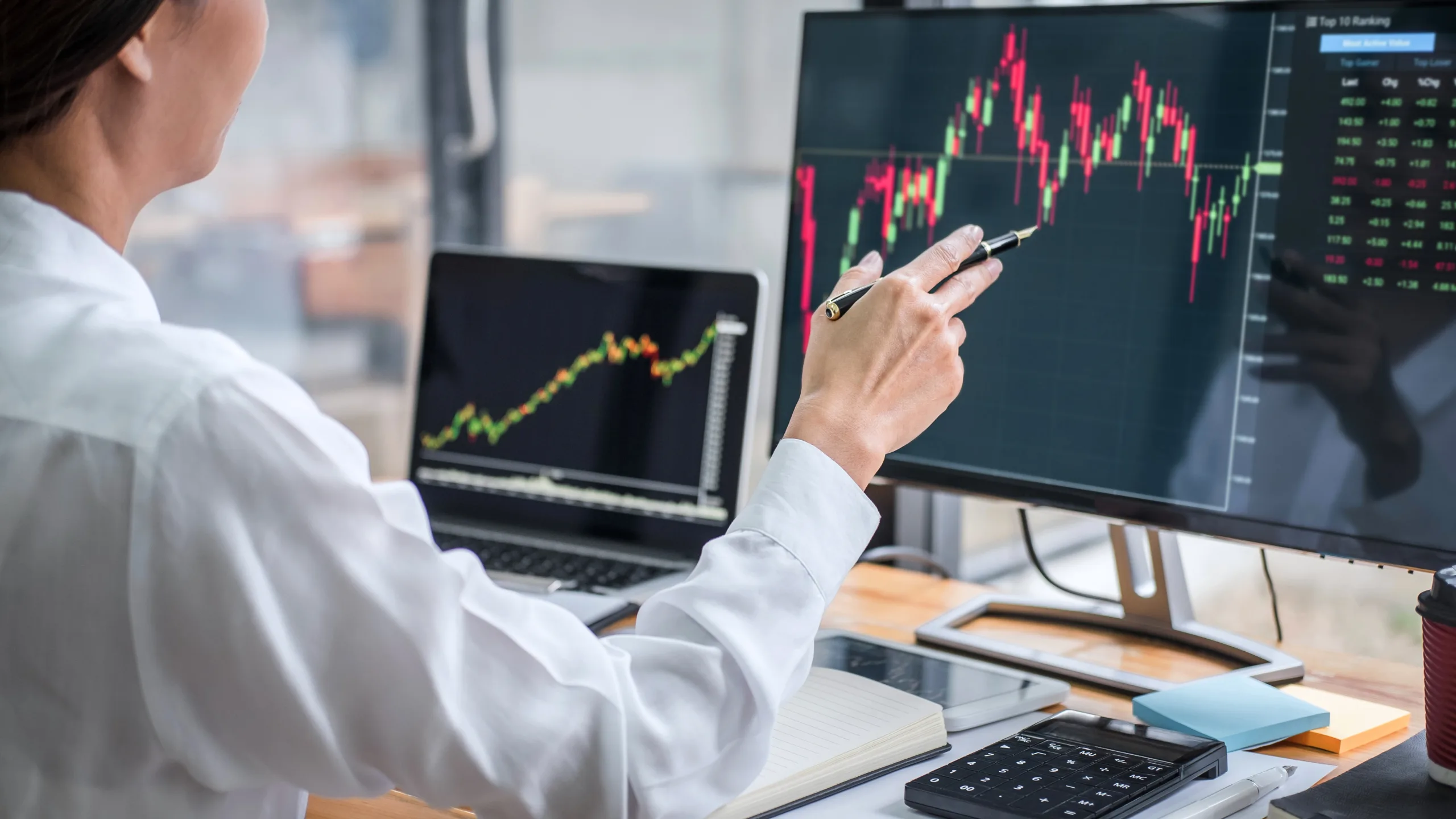 Businesswoman working with computer, laptop, thinking and analyz