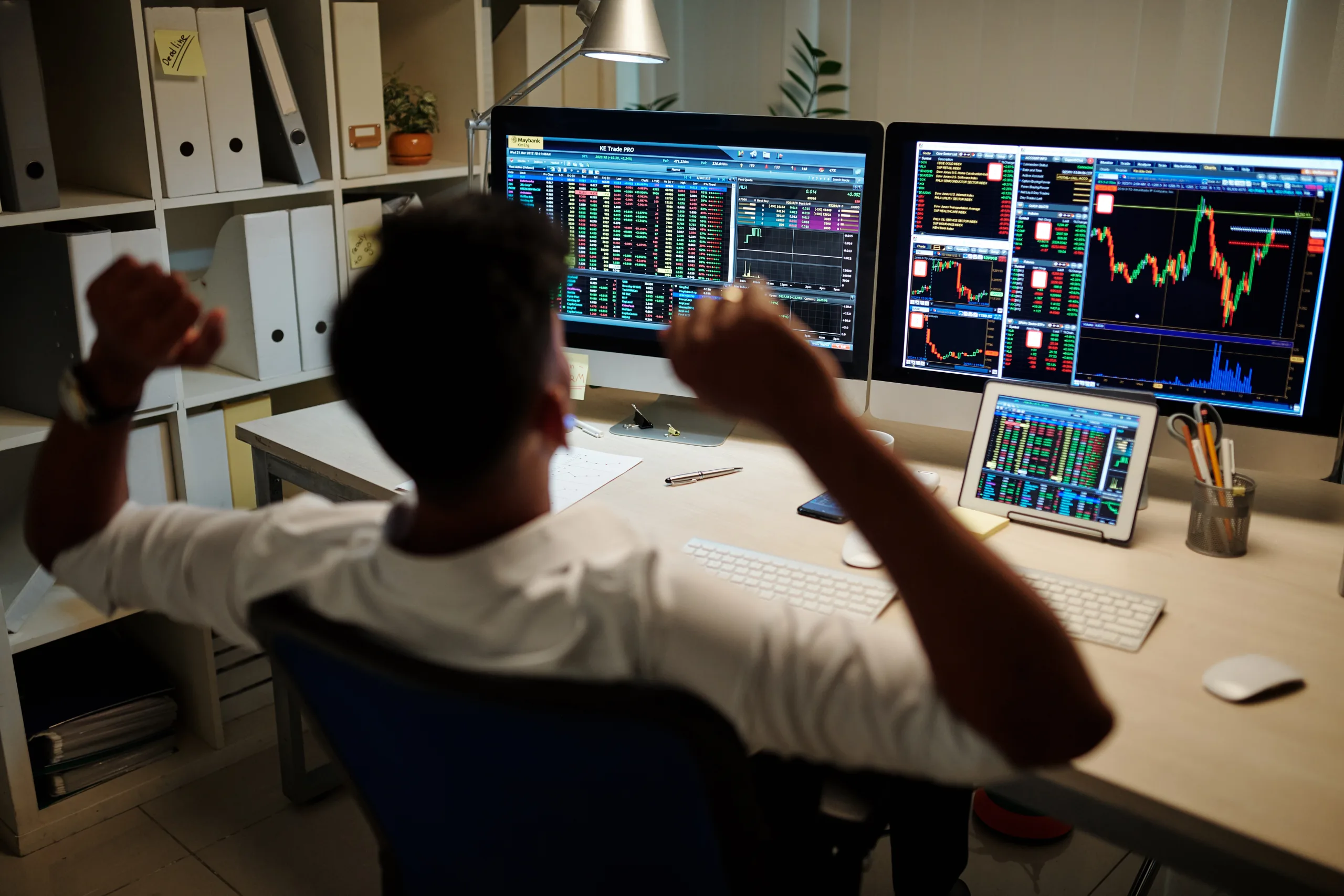Trader stretching in chair